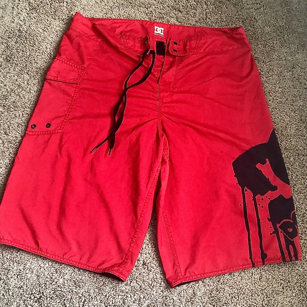 Men’s red swim shorts.